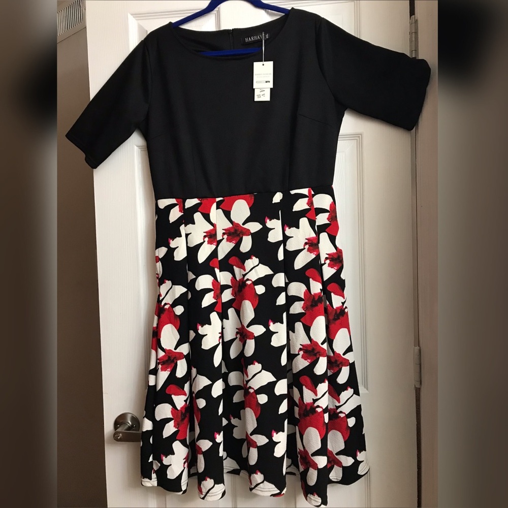 Black dress with floral print.